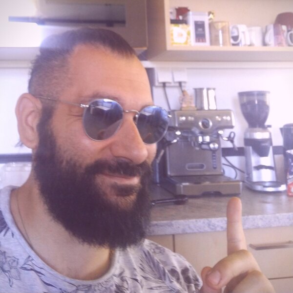 Panagiotis Konstantis with a coffee machine